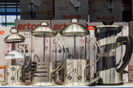 April 12, 2021 Beltsy, Moldova goods on the market shelf. Supermarket showcase. Illustrative editorial. Teapots for teaのeditorial素材