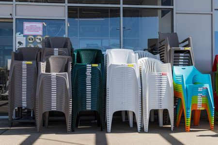 April 12, 2021 Beltsy, Moldova goods on the market shelf. Supermarket showcase. Illustrative editorial. chairs for garden and backyardのeditorial素材