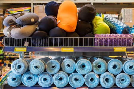 April 12, 2021 Beltsy, Moldova goods on the market shelf. Supermarket showcase. Illustrative editorial. Mats for fitness and yogaのeditorial素材