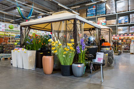 April 12, 2021 Beltsy, Moldova goods on the market shelf. Supermarket showcase. Illustrative editorial. Products for relaxation in the yardのeditorial素材