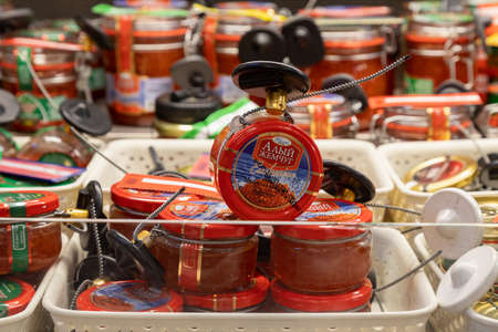 April 22, 2021 Beltsy Moldova goods on the market shelf. Supermarket showcase. Illustrative editorial. Red caviarのeditorial素材