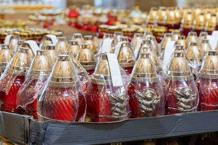 April 22, 2021 Beltsy Moldova goods on the market shelf. Supermarket showcase. Illustrative editorial. Candle lampsのeditorial素材