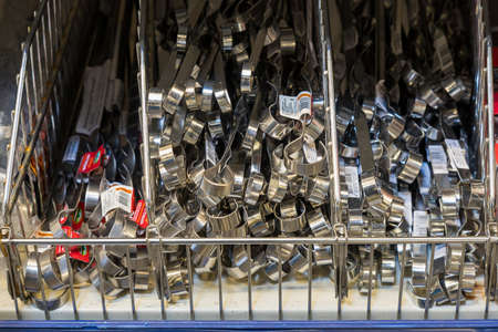 May 12, 2021 Beltsy Moldova supermarket showcase in the picnic department. Metal skewers. Illustrative editorialのeditorial素材