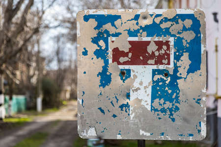 Old dead end road sign. Symbolic background or bottom layer with copy space for textの写真素材