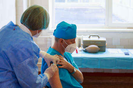 Vaccination of medical personnel. March 2, 2021, Balti Moldova, Illustrative editorial. Selective...