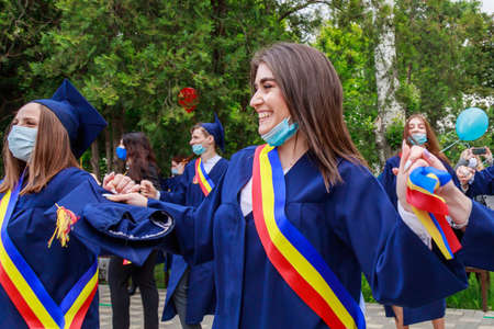 Graduates at the graduation day. Beltsy, Moldova May 31, 2021. Editorial use only.のeditorial素材