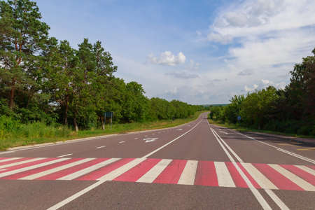 Good road or international highway. Background with copy space for text or inscriptions.の写真素材