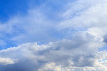 Beautiful blue cloudy sky in windy weather. Background or blank for design.
