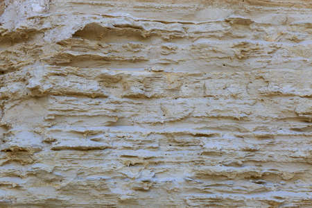 Natural limestone. Background for blank or graphic resource for design. Rough textured surface.の写真素材