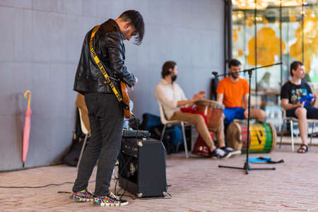 Street musicians in an urban environment. May 2, 2021 Balti Moldova. Illustrative editorial