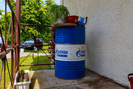 A fuel or oil barrel with the inscription GAZPROM NEFT. Illustrative editorial. July 4, 2021 Soroca Moldova.のeditorial素材