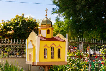 Small model of a large church. Beautiful classical old architecture. Travel and sightseeing trips. Background with copy space for text or inscriptions.の写真素材