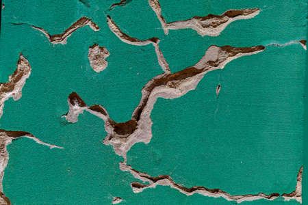 Scary shabby wall in grunge style. Rough textured surface. A background for a blank or a graphic resource for your design.の写真素材