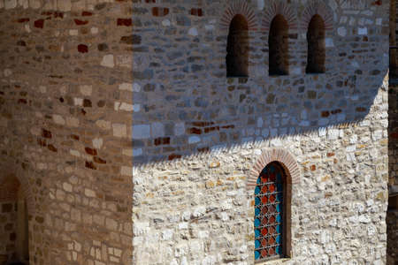 Fortress window. Architectural medieval background with copy space for text or lettering.の写真素材
