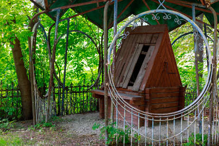 An old manual well with drinking water. Background with copy space for text or inscriptions.の写真素材