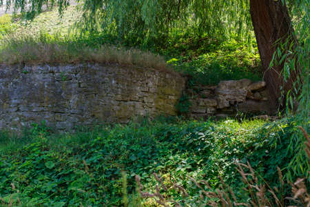 A spring with drinking water, a natural source to quench your thirst on a journey. Background with...