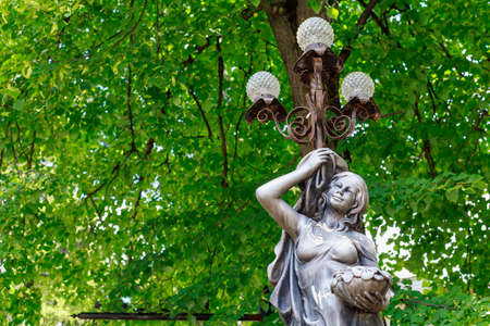 City pillars with lanterns as a travel symbol. Background with copy space for text or inscriptions.
