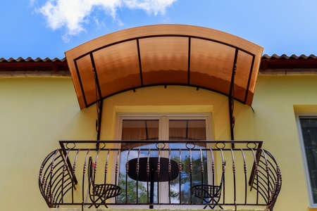 Nice open balcony. Background with copy space for text or inscriptions.の写真素材