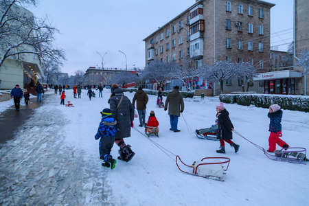February 1, 2021 Balti or Beltsy, Moldova evening sledding on the citys central hill. Illustrative editorial. Backgroundのeditorial素材