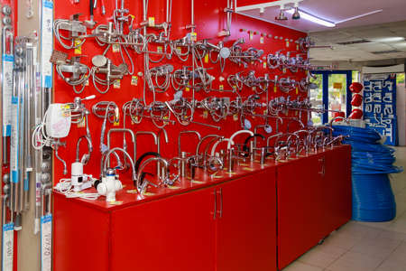 Plumbing faucets or taps for bathroom and kitchen. Selective focus background with copy space for text. Illustrative editorial. September 24, 2021 Balti Moldova.のeditorial素材