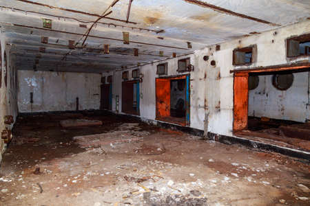 The interior of an underground anti nuclear abandoned secret military bunker. Creepy place, post apocalyptic background.の写真素材