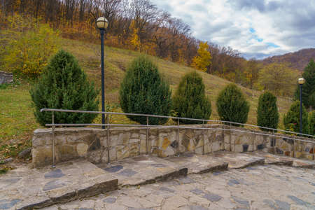 Steps made of wild decorative stone. Cobbled modern sidewalk. Background with copy space for text or...