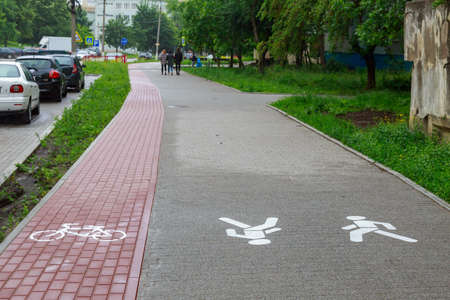 Sidewalks in an urban environment. Background with copy space for text or inscriptions. Illustrative editorial. June 14, 2021 Balti Moldova.のeditorial素材