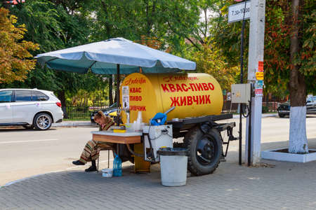 Sale of kvass and beer from a barrel. Welcome to Gagauzia. Illustrative Editorial. September 5, 2021 Komrat, Moldova.のeditorial素材