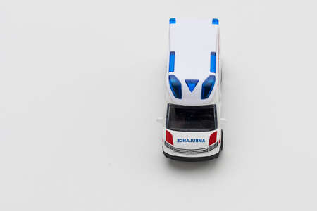 January 8, 2020 Balti Moldova toy ambulance car on a light background. An important structure in the emergency services in the world.のeditorial素材