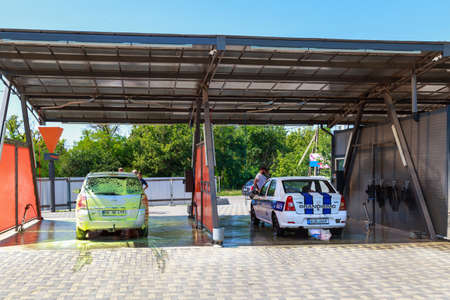 Modern city car wash. Background with copy space for text or lettering. Illustrative editorial. July...