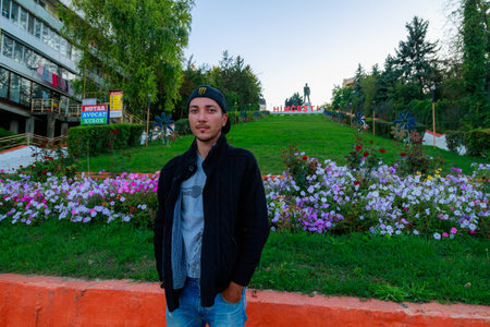Tourist in the city center with a monument to Kotovsky. Background with copy space for text or inscriptions. September 5, 2021 Hincesti Moldova.のeditorial素材