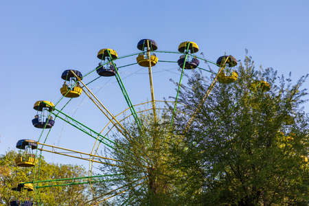 Ferris wheel in the park. Illustrative editorial. May 9, 2021 Balti Moldova. Background with copy space for text.のeditorial素材