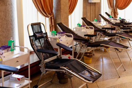 Blood donation medical chair. Public event for blood donor day. Background with copy space for text or lettering. Illustrative editorial. June 13, 2021, Balti Moldova.のeditorial素材