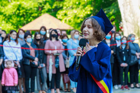 Graduates at the graduation day. Beltsy, Moldova May 31, 2021. Editorial use only.のeditorial素材