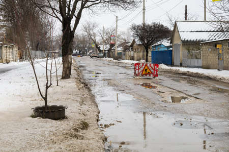 February 1, 2021 Balti or Beltsy Moldova, Road repair works in an urban environment with a bad...