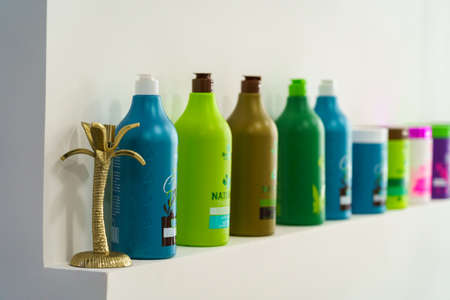 Bottles with cosmetics for hair care in a beauty salon. Illustrative editorial. October 10, 2021 Balti Moldova.のeditorial素材
