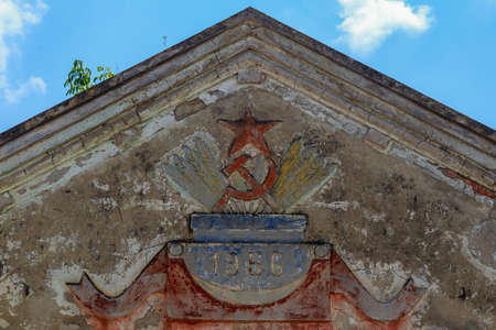 Soviet agricultural building in the village. Urban Architecture. Background with copy space for text. Abandoned objects of the USSR timesのeditorial素材