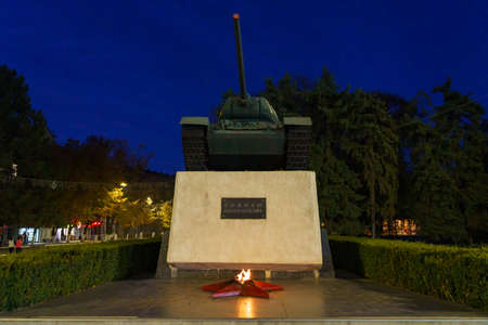Monument to the tank that liberated the city from the Nazis. Night city. Background with copy space for text. Illustrative editorial. October 22, 2021 Balti Moldova.のeditorial素材