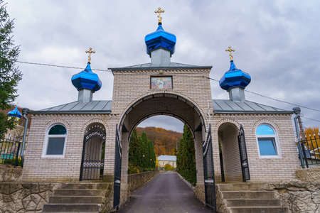 Entrance to the Holy Dormition Convent. Welcome to Moldova. Illustrative editorial. October 24 2021, Kalarashovka Moldova.のeditorial素材