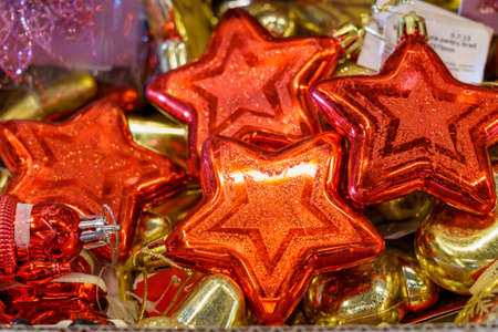 Asterisks or stars as a symbol. Christmas decor for the interior on a store shelf. Winter symbol, New Years atmosphere. Background with copy space for textの写真素材