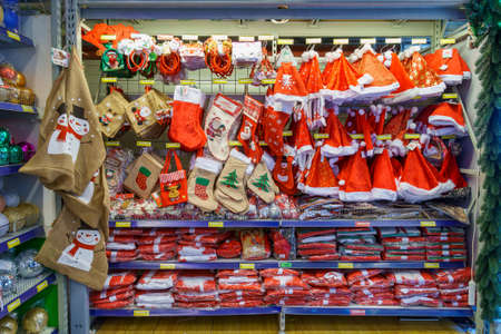 Decorative Christmas clothes and hats. Decor and costumes for the New Year. Background with copy space for text. Illustrative editorial. December 18, 2021 Balti Moldova.のeditorial素材