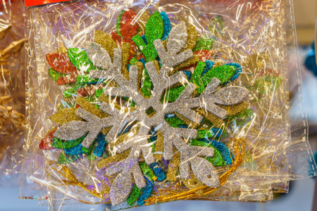 Classic snowflake as a symbol. Christmas decor for the interior on a store shelf. Winter symbol, New Years atmosphere. Background with copy space for textの写真素材