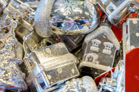 Shiny Christmas tree house. Christmas decor for the interior on a store shelf. Winter symbol, New Years atmosphere. Background with copy space for textの写真素材