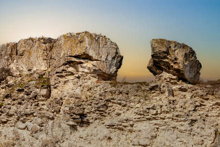 Wild rocky and mountainous nature of Eastern Europe. Landscape background with copy space for text. Selective focus, toned. Coban or Cobani village, welcome to Moldova.の写真素材