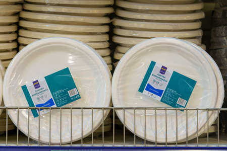 Disposable plates. Background with copy space for text. Illustrative editorial. December 18, 2021...
