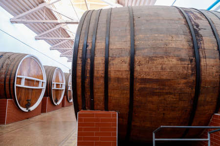 A huge barrel for aging elite alcohol. Background with copy space for text