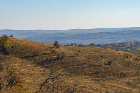 Hilly fields of Eastern European lowland nature. Background with copy space for text.