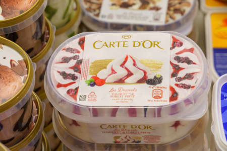 December 2, 2021 Balti Moldova. Illustrative editorial. Ice cream in a plastic container on a supermarket shelf. Background with copy space for text or inscriptions.のeditorial素材