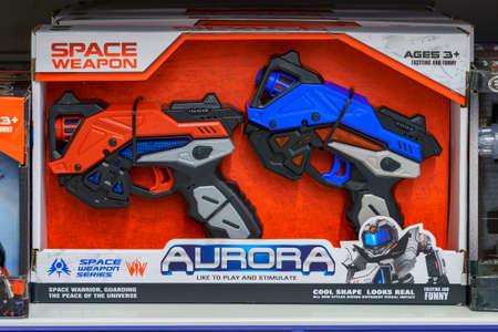 December 3, 2021 Balti Moldova. Illustrative editorial. A pistol on a supermarket shelf in the toy...