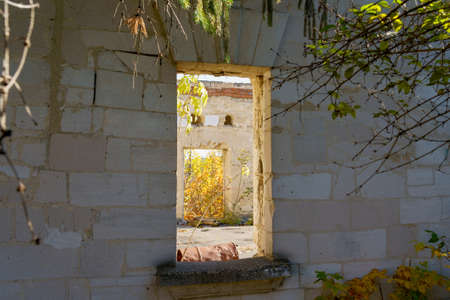 The wall of an old ruined estate. Building or house. Background